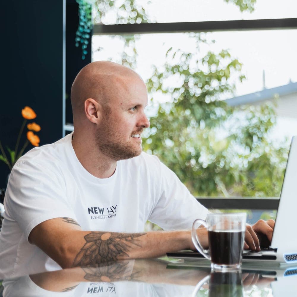 Steve Clifford, founder of Human Powered, working at his desk